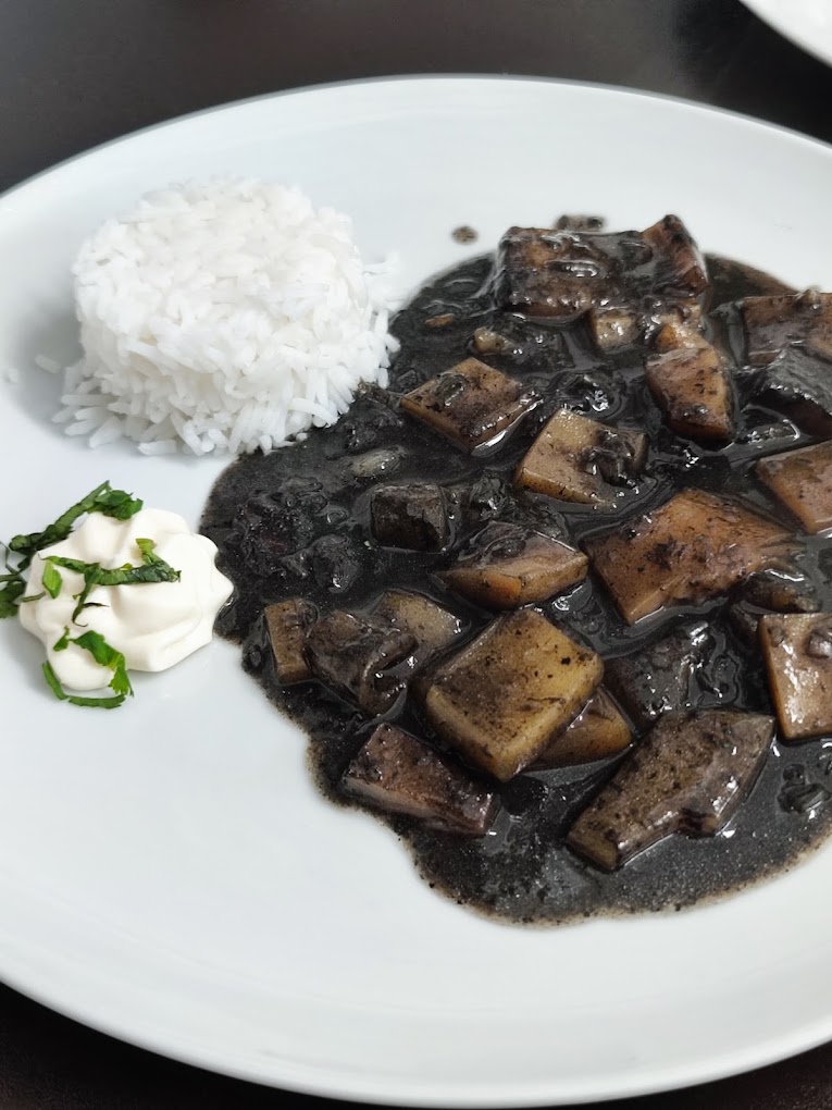 Calamares en su tinta con arroz